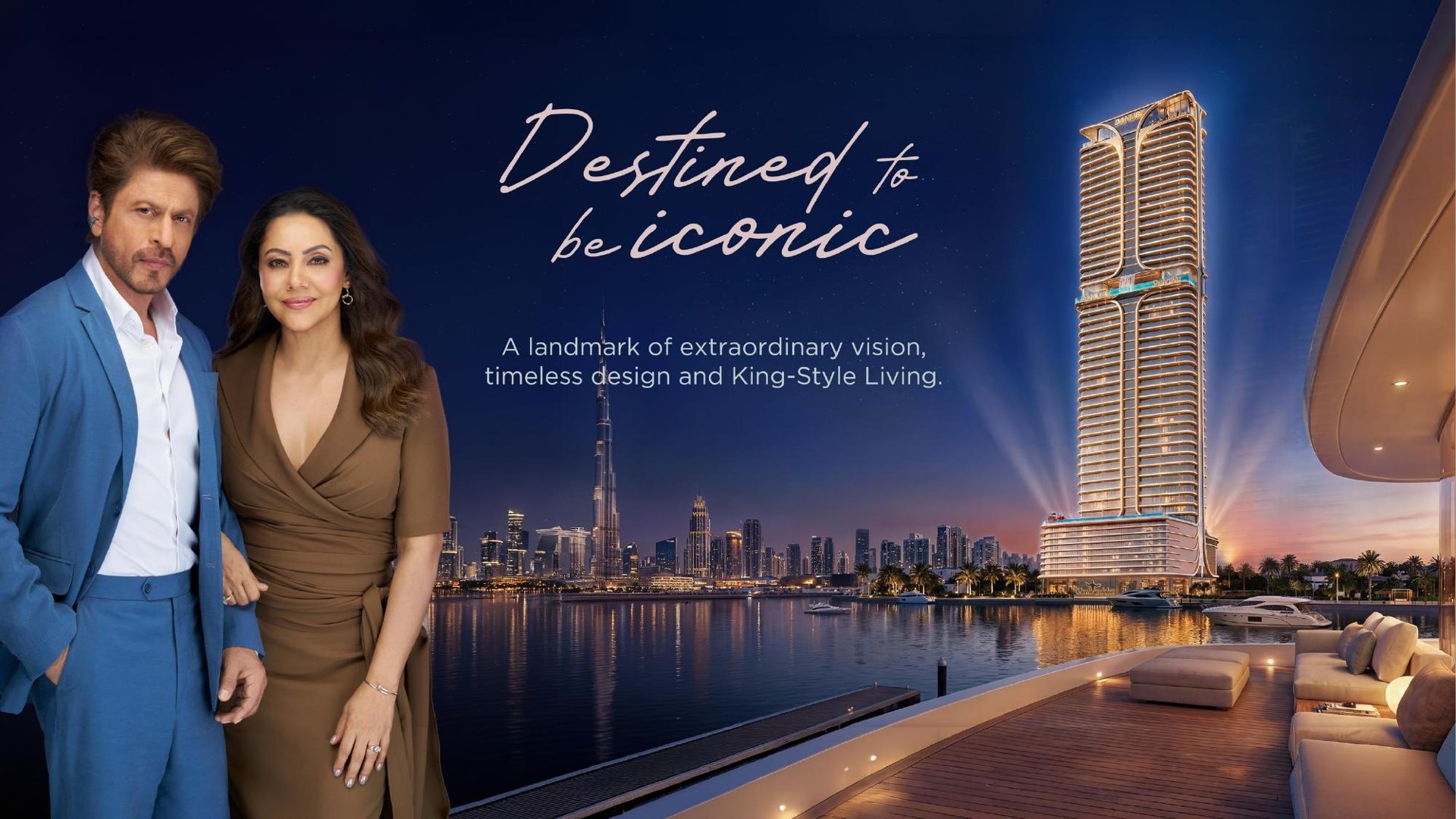 Shah Rukh Khan and Gauri Khan with Shahrukhz Residences at night, Dubai skyline